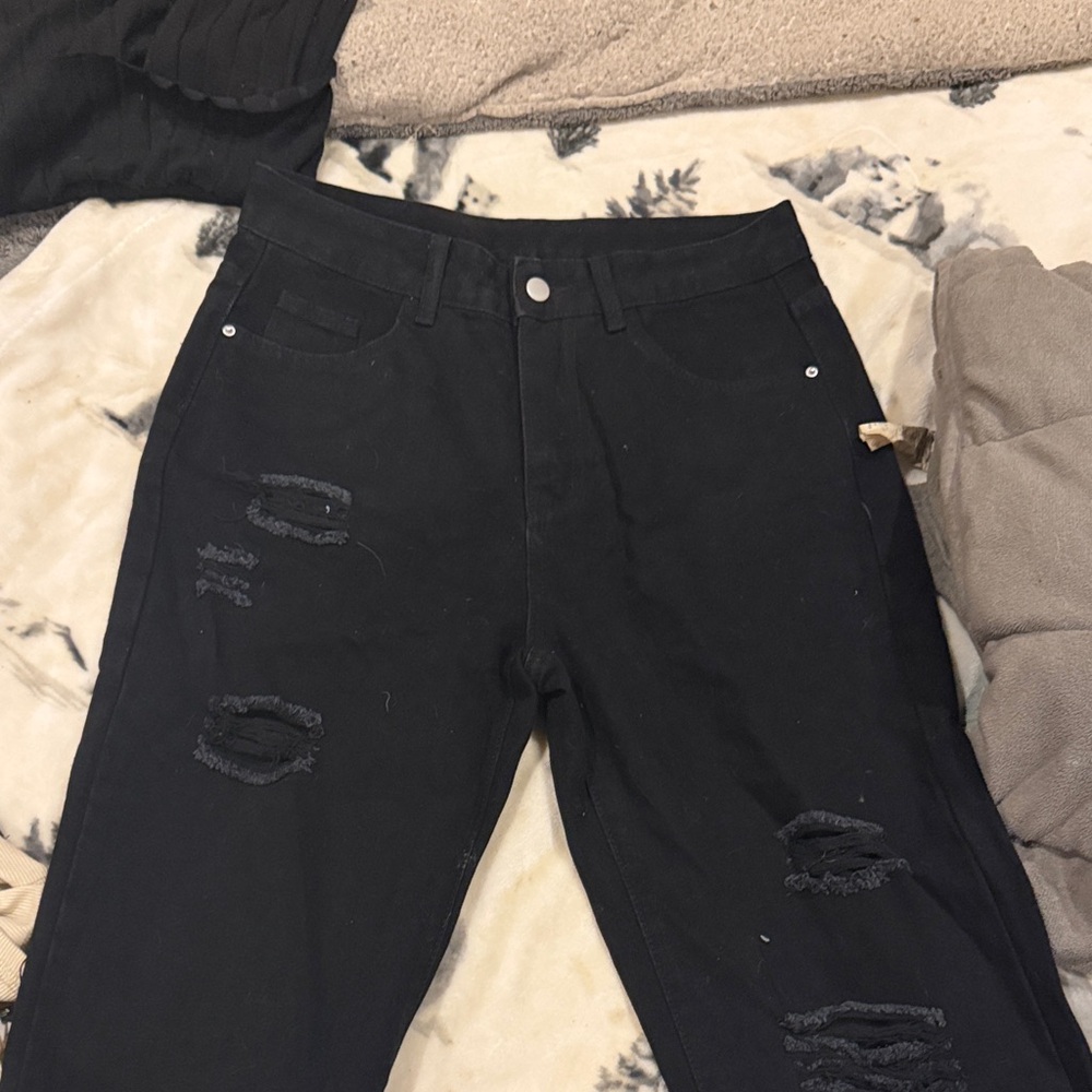 Women's black high waisted ripped jeans